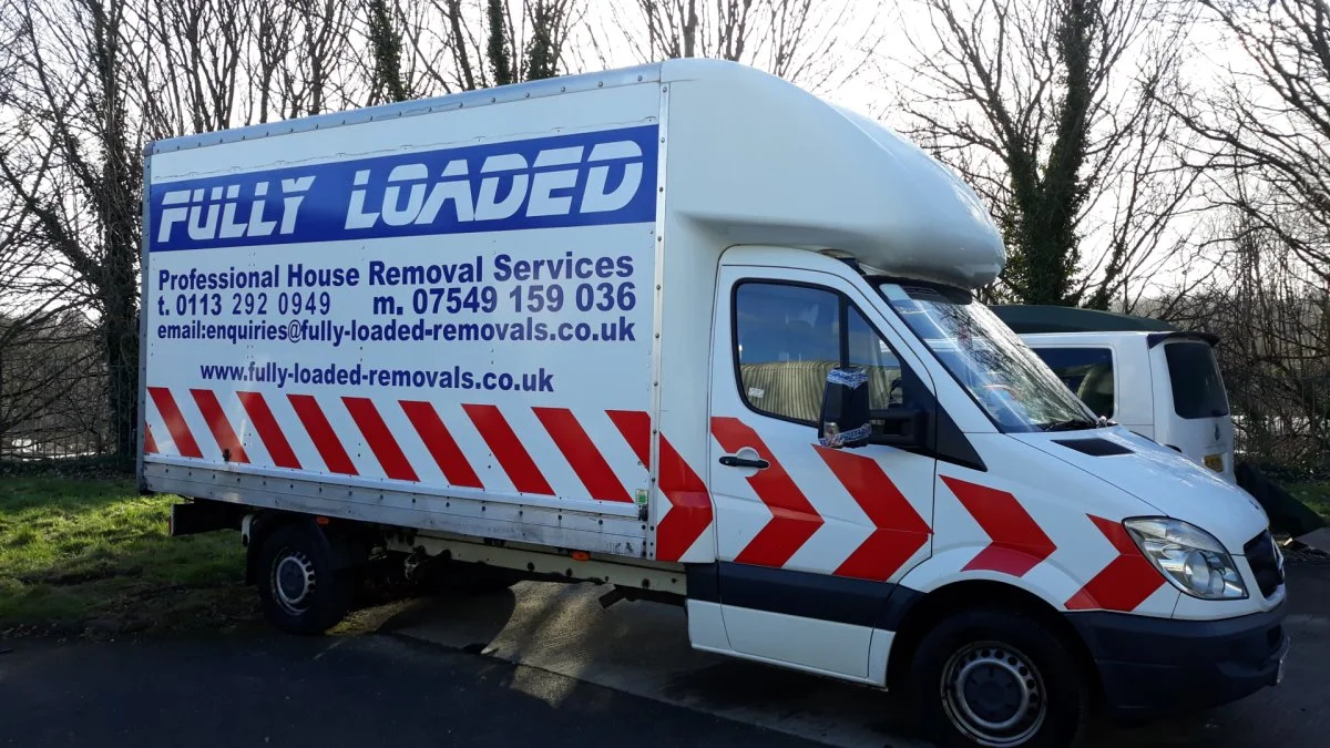 Fully Loaded Removals Luton van in the company livery