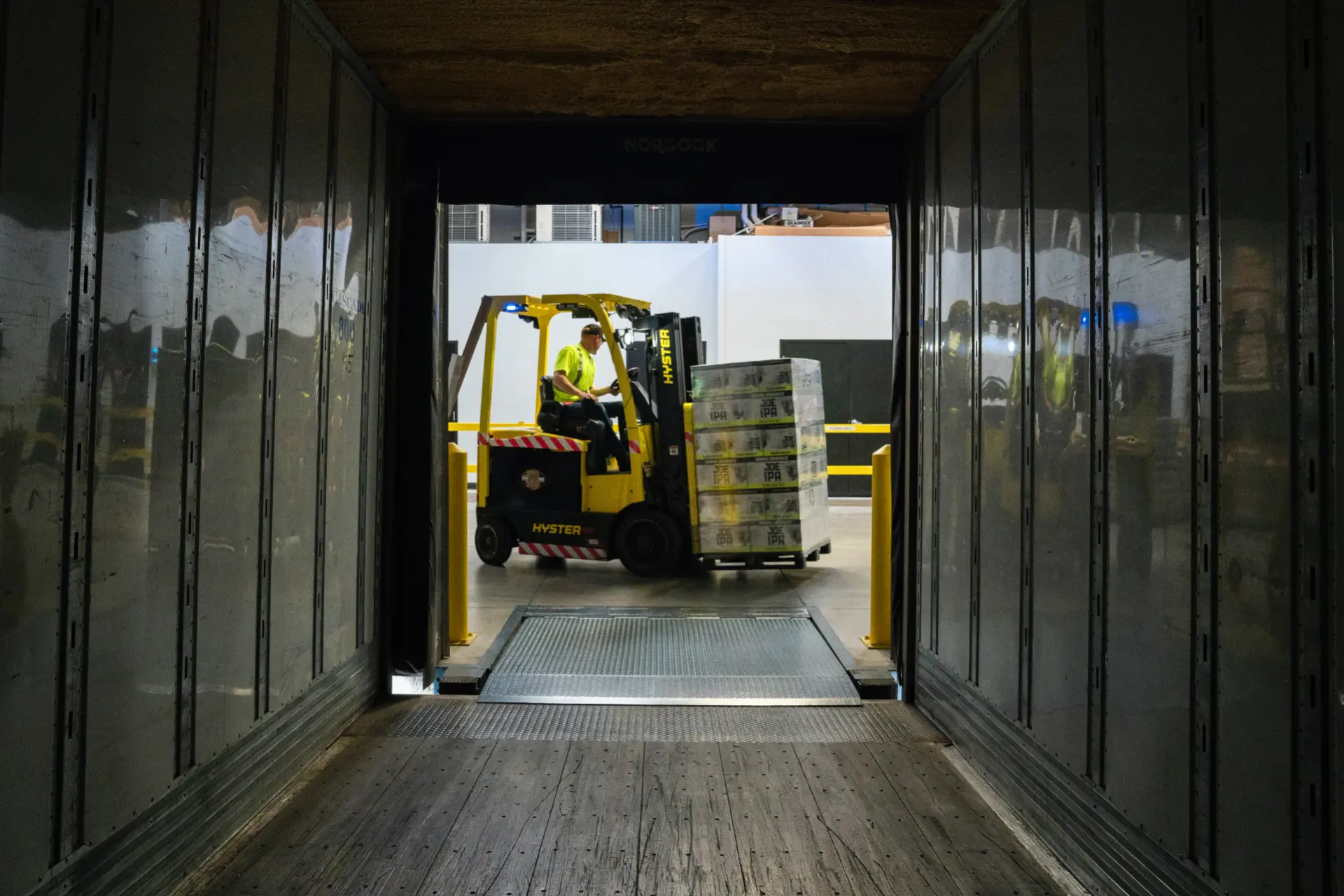 Forklift at a warehouse loading bay