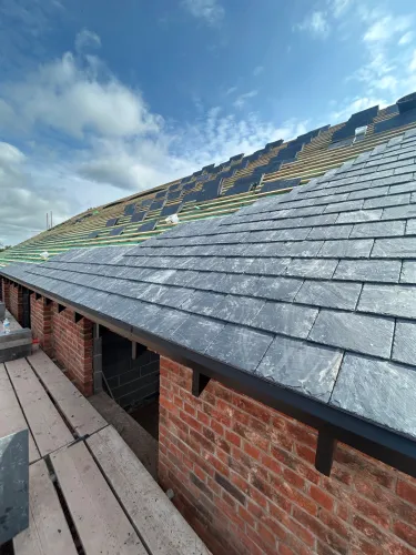 New Spanish slate roof with 7 velux (image 5 of 21)