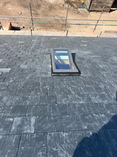 New Spanish slate roof with 7 velux (image 8 of 21)