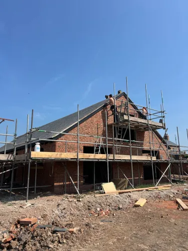 New Spanish slate roof with 7 velux (image 10 of 21)