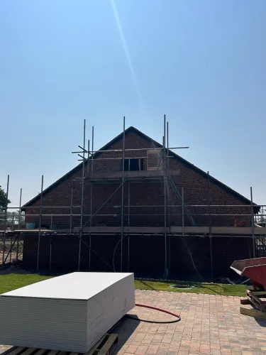 New Spanish slate roof with 7 velux (image 14 of 21)