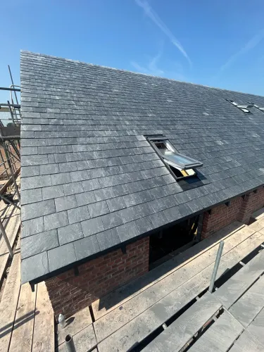 New Spanish slate roof with 7 velux (image 15 of 21)