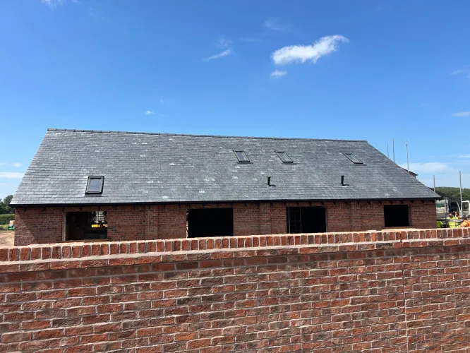 New Spanish slate roof with 7 velux (image 18 of 21)