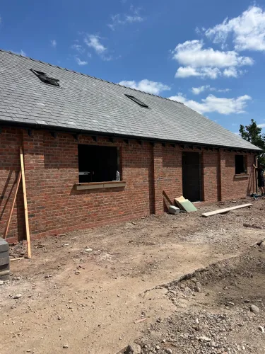 New Spanish slate roof with 7 velux (image 21 of 21)