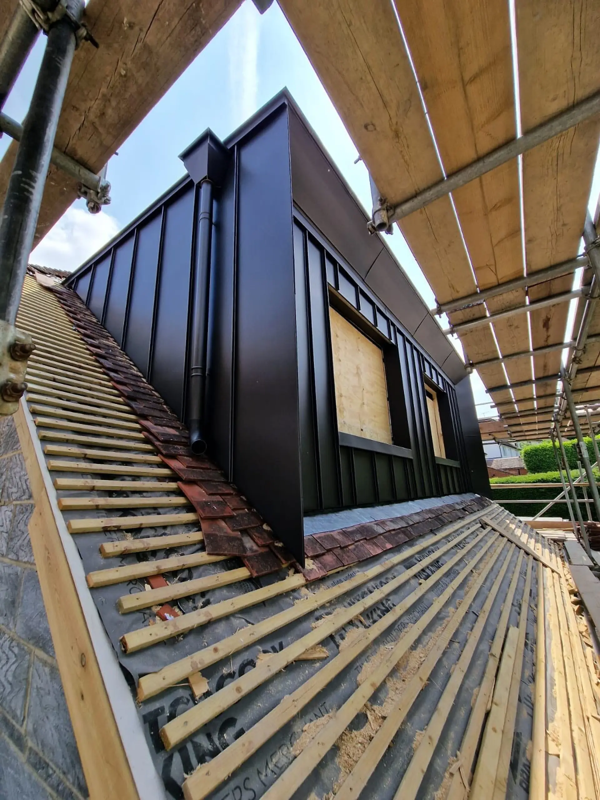 Contemporary dormer with VM Zinc Anthra and concealed secret gutter, London