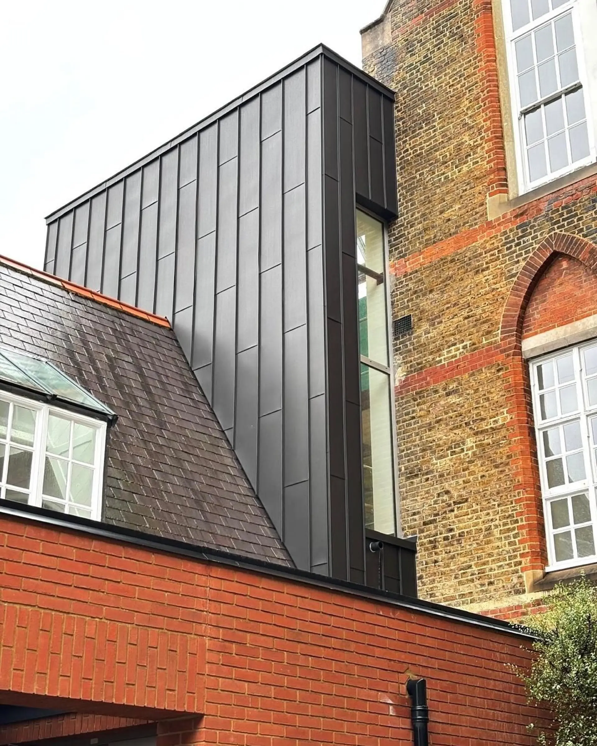 Commercial VMZINC Anthra standing seam cladding replacement project, London