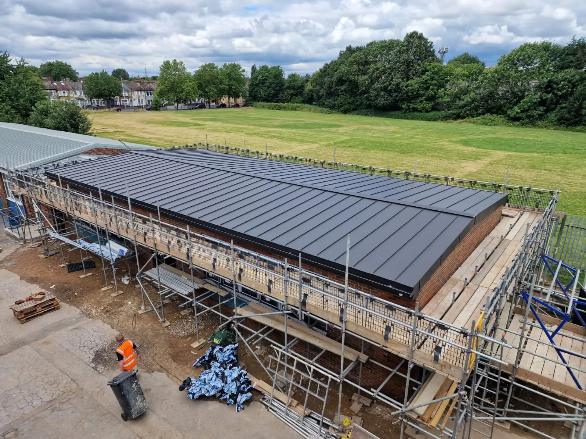 Educational college VM Zinc standing seam roof with concealed secret gutter, London