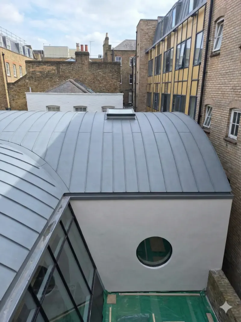 Commercial standing seam barrel roof on warm roof build-up with Rockwool insulation, Soho London