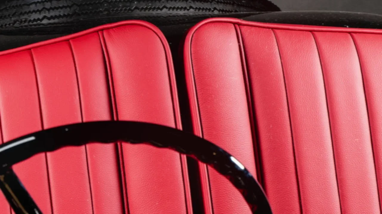Red pleated leather seats in a 1934 BMW Frazer Nash