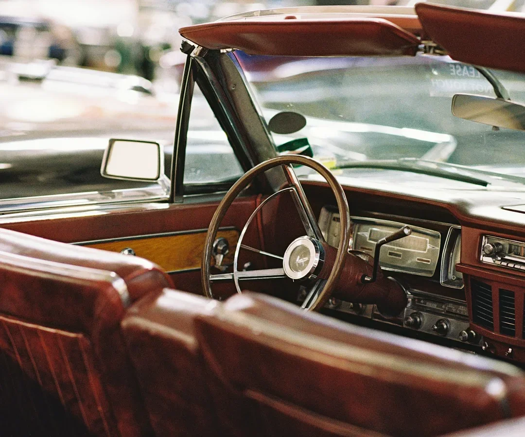 Brown leather seats in a vintage convertible