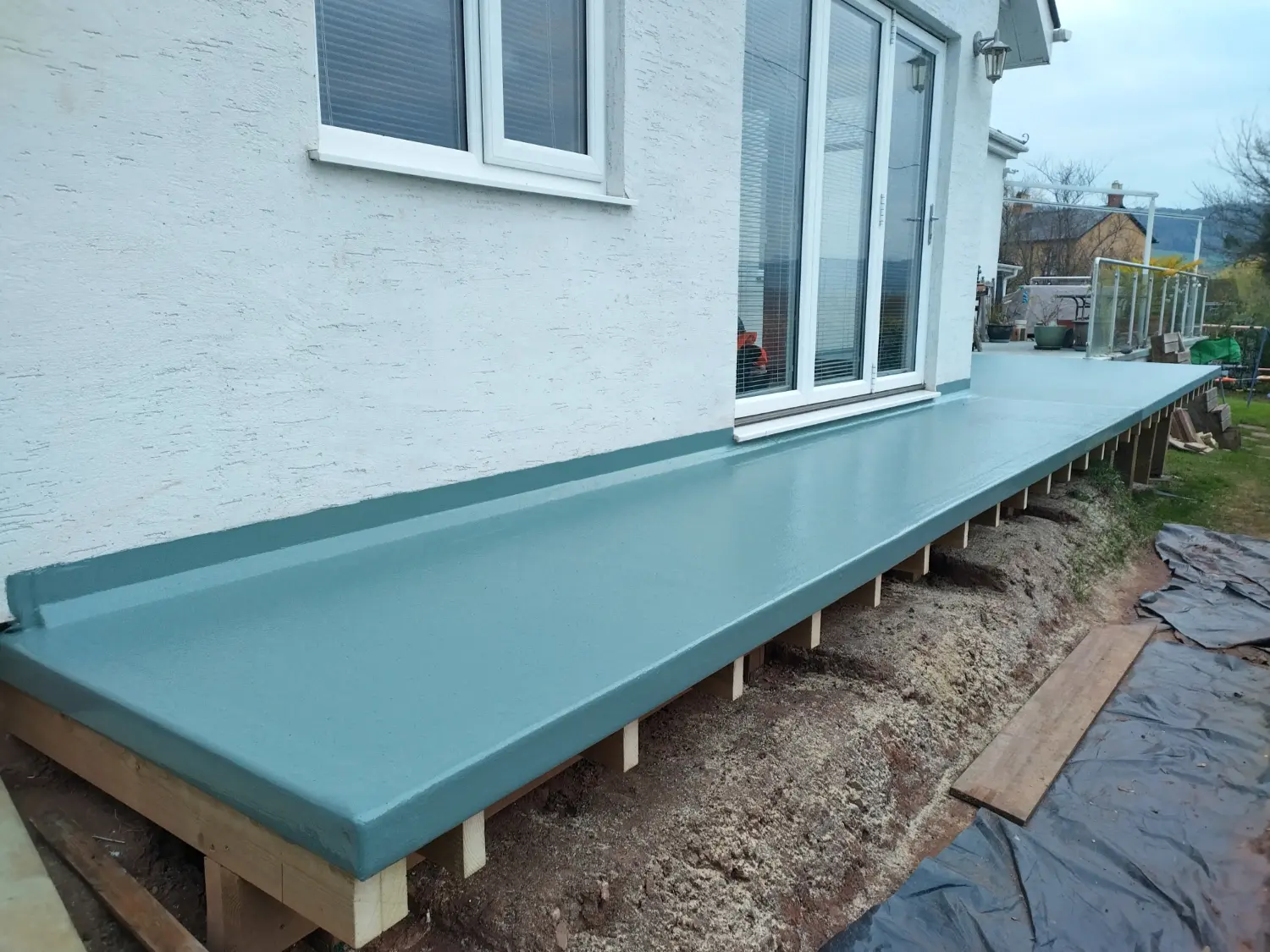 Green flat roof on walkway Chepstow.
