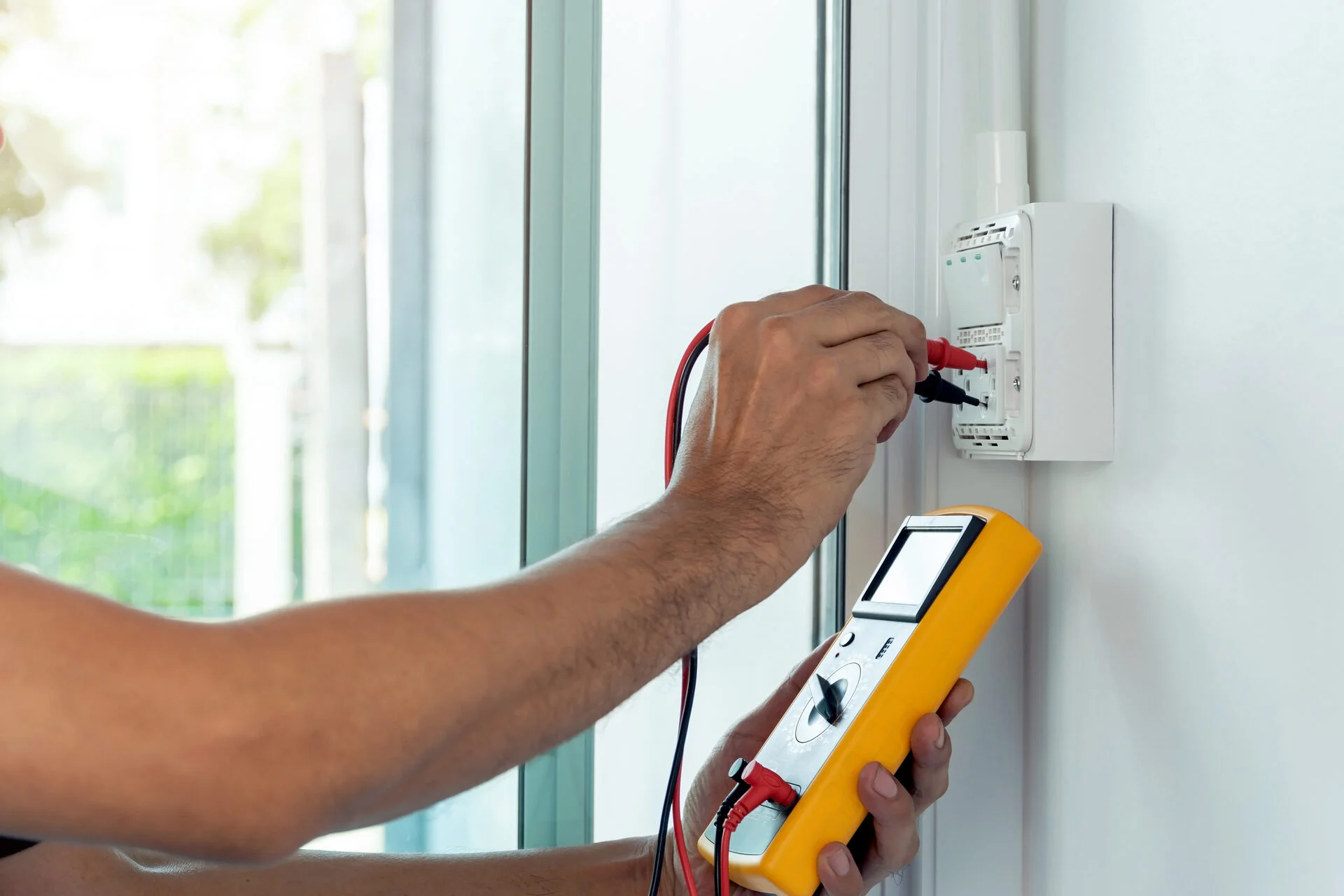 Electrician testing circuits for an EICR in Bristol