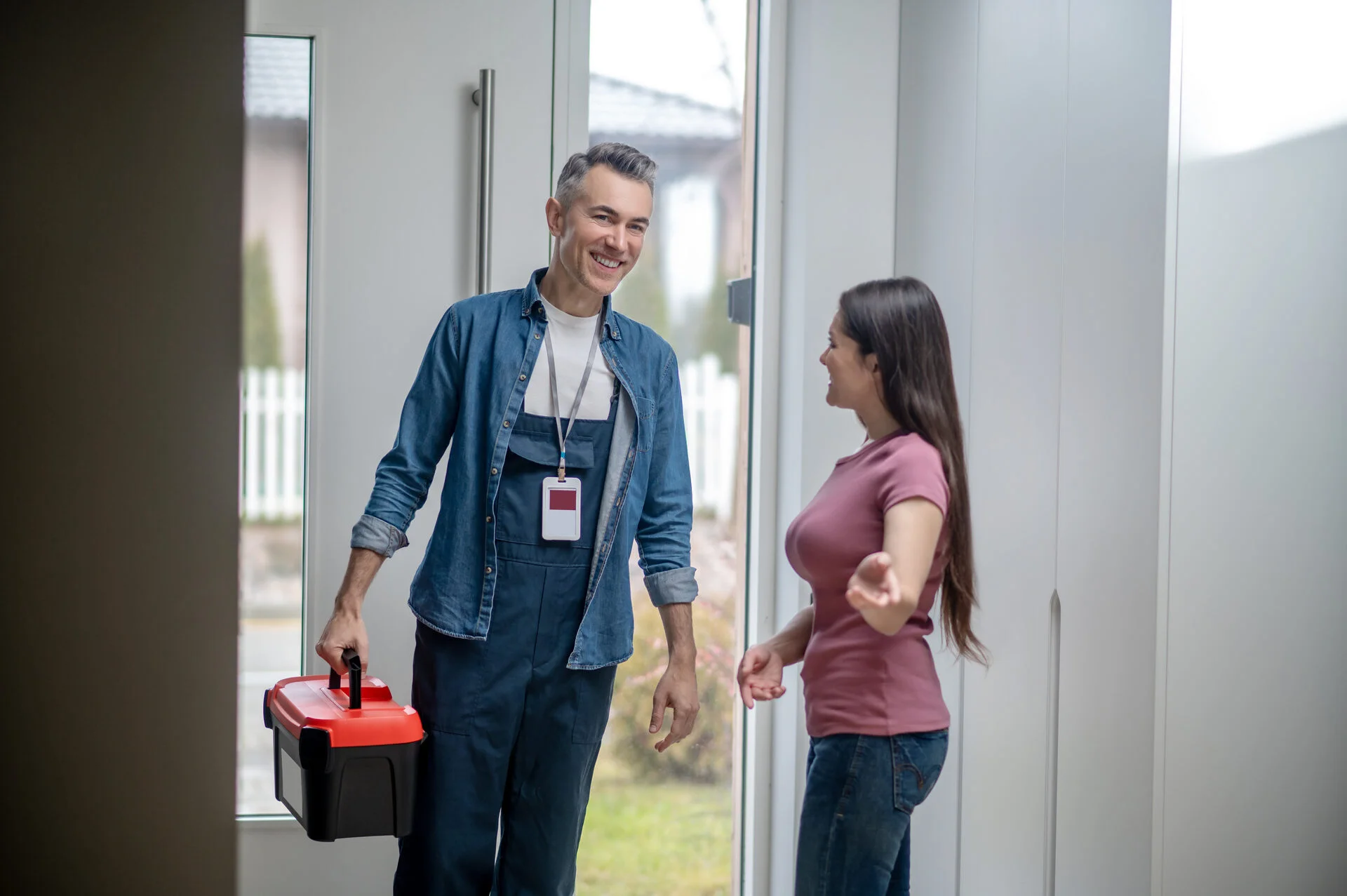 Electrician explaining test results to a homeowner in Redland