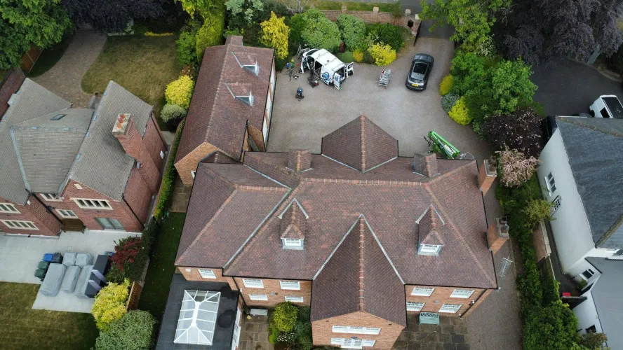 Large Property Roof Cleaning and Moss Removal Transformation (image 2 of 4)