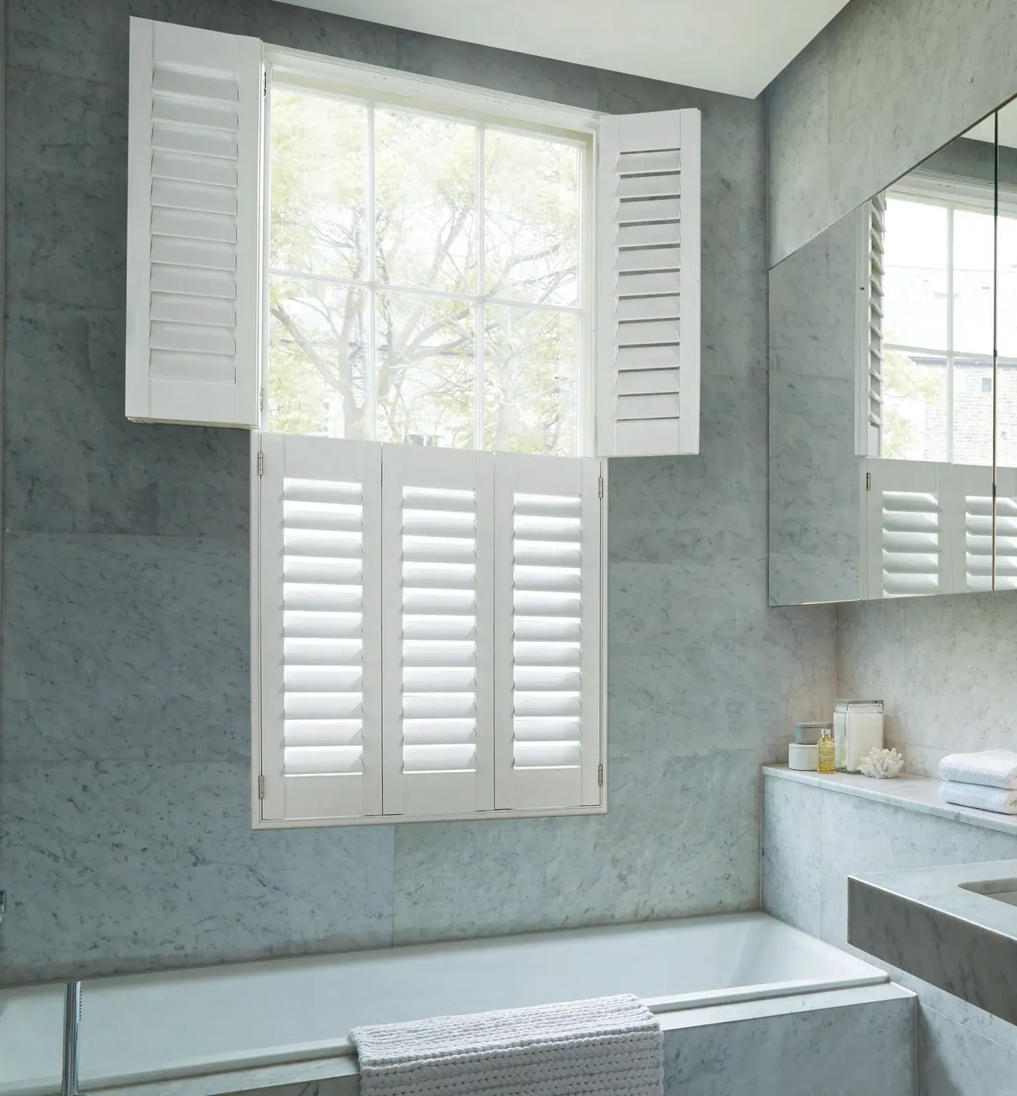 Water-resistant shutters fitted for privacy in a Swansea bathroom