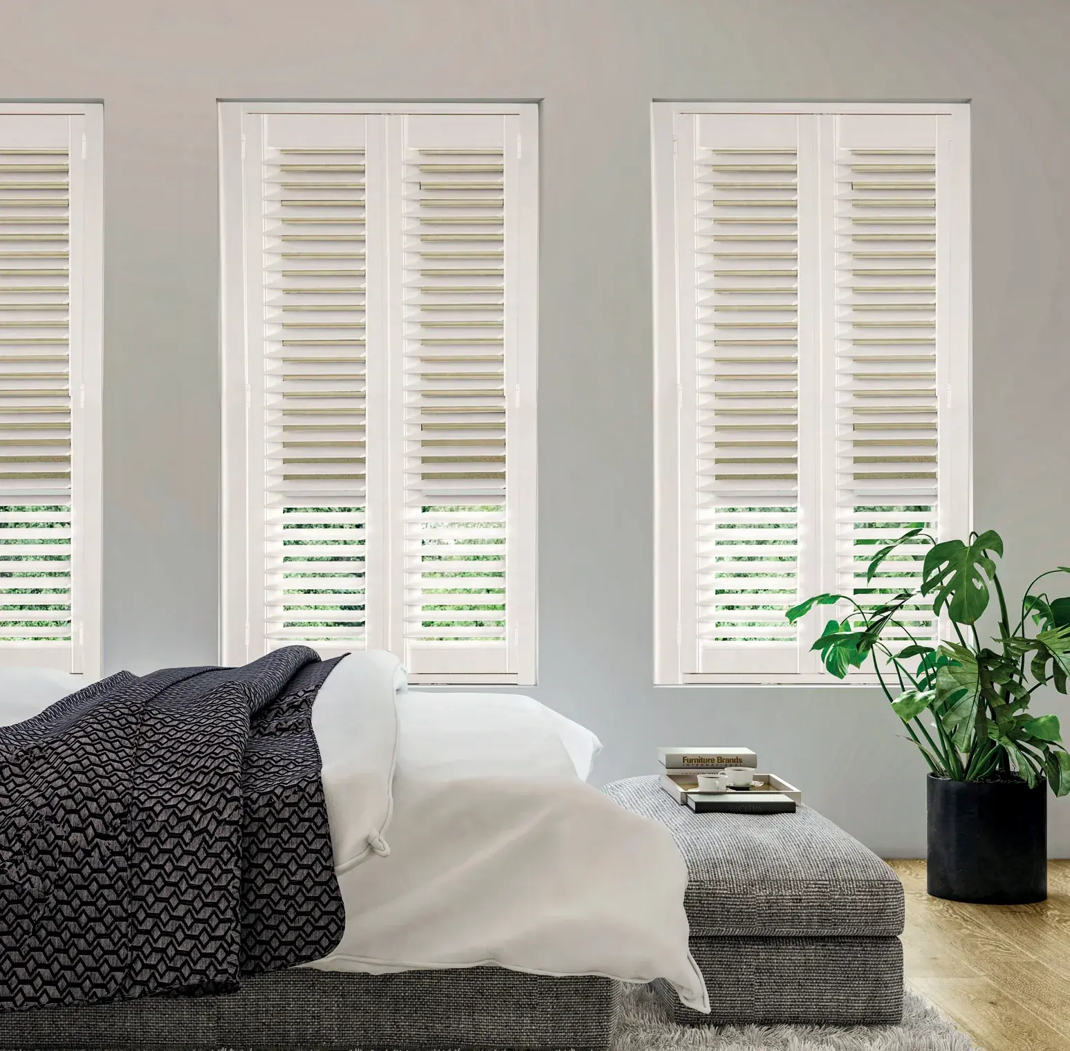 Made-to-measure shutters for a Cwmbran bedroom with coordinating shade