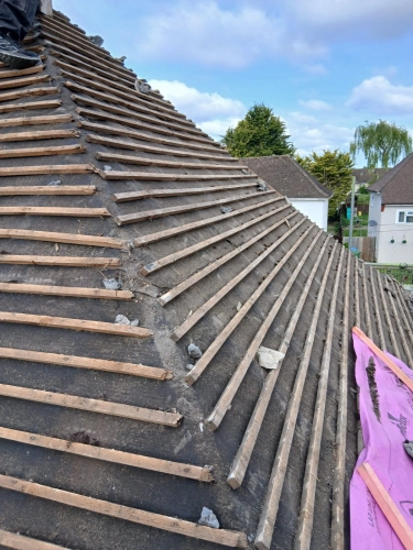 Full Roof Strip and New Tile Installation (image 4 of 13)