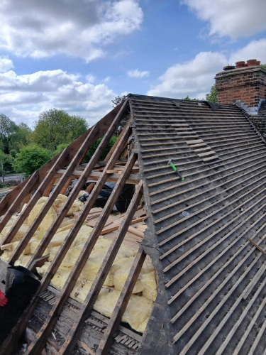 Full Roof Strip and New Tile Installation (image 6 of 13)