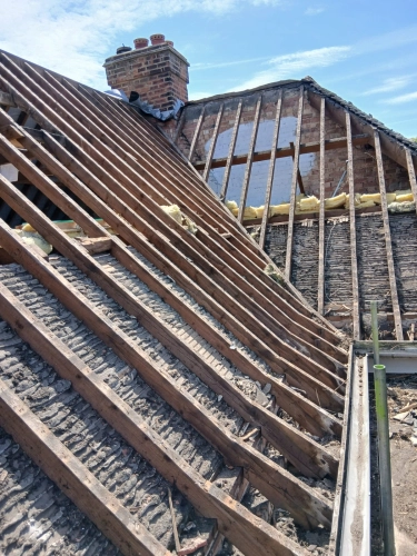 Full Roof Strip and New Tile Installation (image 7 of 13)