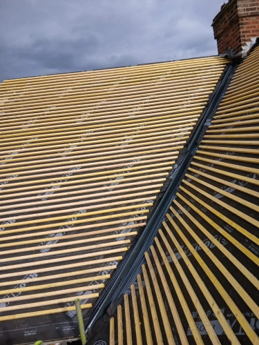 Full Roof Strip and New Tile Installation (image 12 of 13)