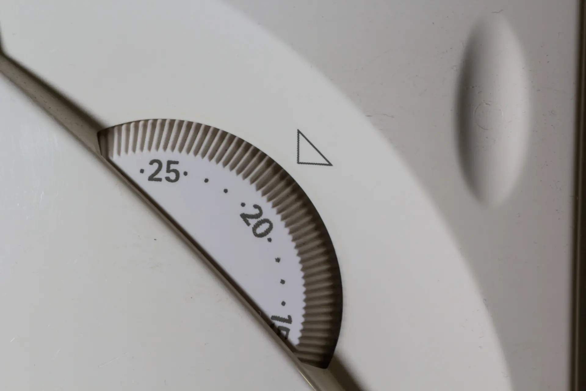 Close-up of a central heating control dial