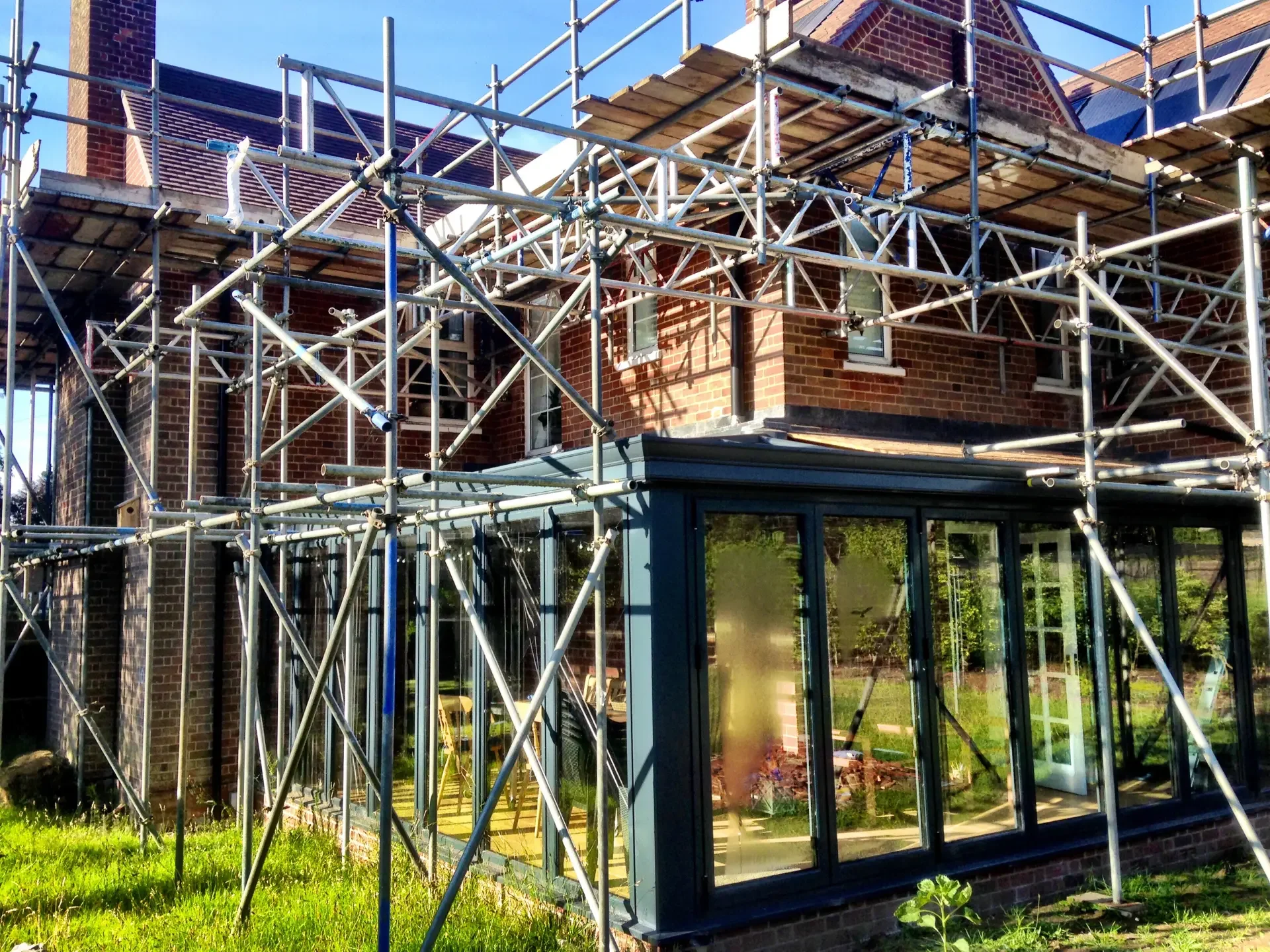 Scaffolding around a house extension
