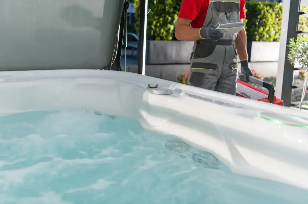 Hot tub technician carrying out a professional service