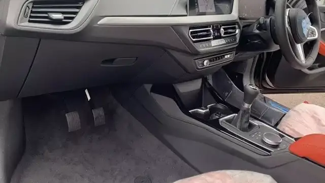 A passenger footwell with the dual control pedals fitted
