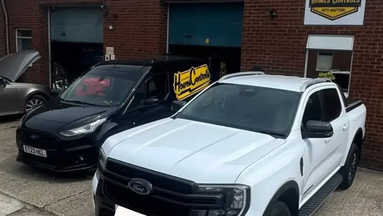 Vehicles outside the Howes Controls unit