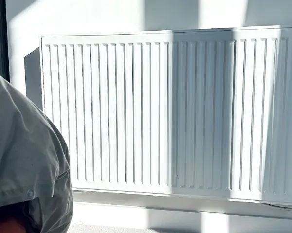 White radiator in a bedroom