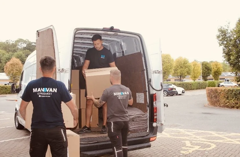 Man with a van loading furniture in Gloucester
